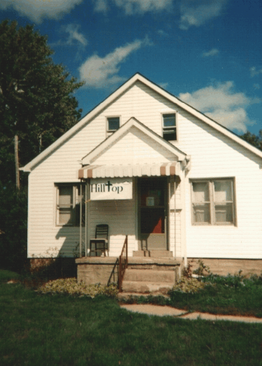 Hilltop's Stoop and Sign